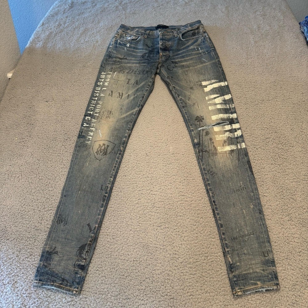 AMIRI - Military Stencil Skinny-Fit Logo-Print Distressed Jeans - Blue 31x34”